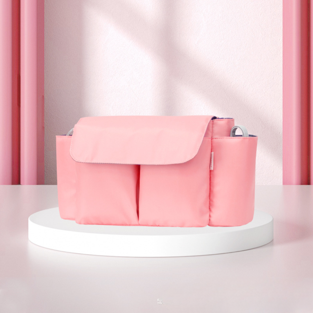 Pink_df2b42f5-1fd2-4bb7-9649-9dda8cc71fd0 ToddlerOrganizer– Waterafstotend&Ruim– Kinderwagen Organizer met Flessenhouders Roze | Educatief Speelgoed - Afbeelding 1