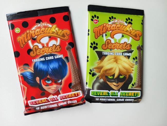 Miraculous Secrets - Boosterpack (= 10 kaarten) - Collectible Card Games Miraculous Secrets - Boosterpack (= 10 kaarten) - Collectible Card Games - Afbeelding 1