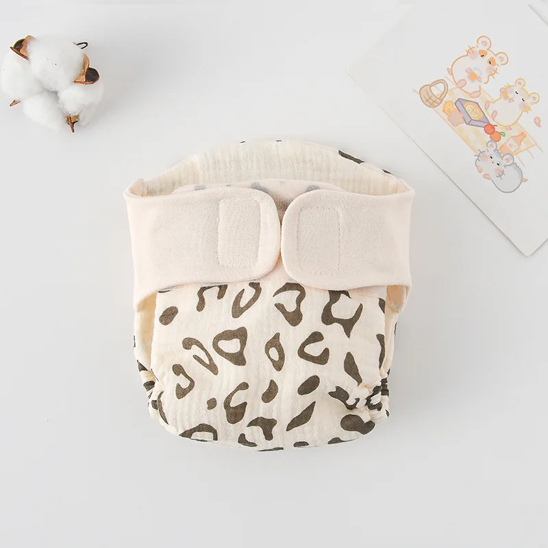 24_a51bfa0d-07a9-4978-bd82-04666eb2be6a ComfyCotton– Waterdicht&Veilig– Biokatoenen Oefenbroekjes Koffie Luipaard / L (10-14.5kg) - 9-15 maanden | Educatief Speelgoed - Afbeelding 1