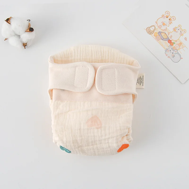 33_e73bff80-50cc-4612-a429-6bef9b2fefa5 ComfyCotton– Waterdicht&Veilig– Biokatoenen Oefenbroekjes Beige kleurige liefde / L (10-14.5kg) - 9-15 maanden | Educatief Speelgoed - Afbeelding 1