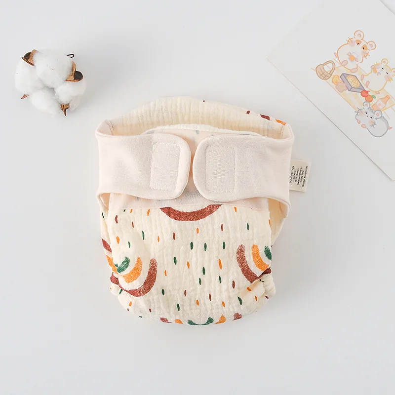 6_5137e0dc-4adf-4639-a5ab-9141cecacc4e ComfyCotton– Waterdicht&Veilig– Biokatoenen Oefenbroekjes Regenboog regendruppels / M (5.5-10kg) - 3-9 maanden | Educatief Speelgoed - Afbeelding 1